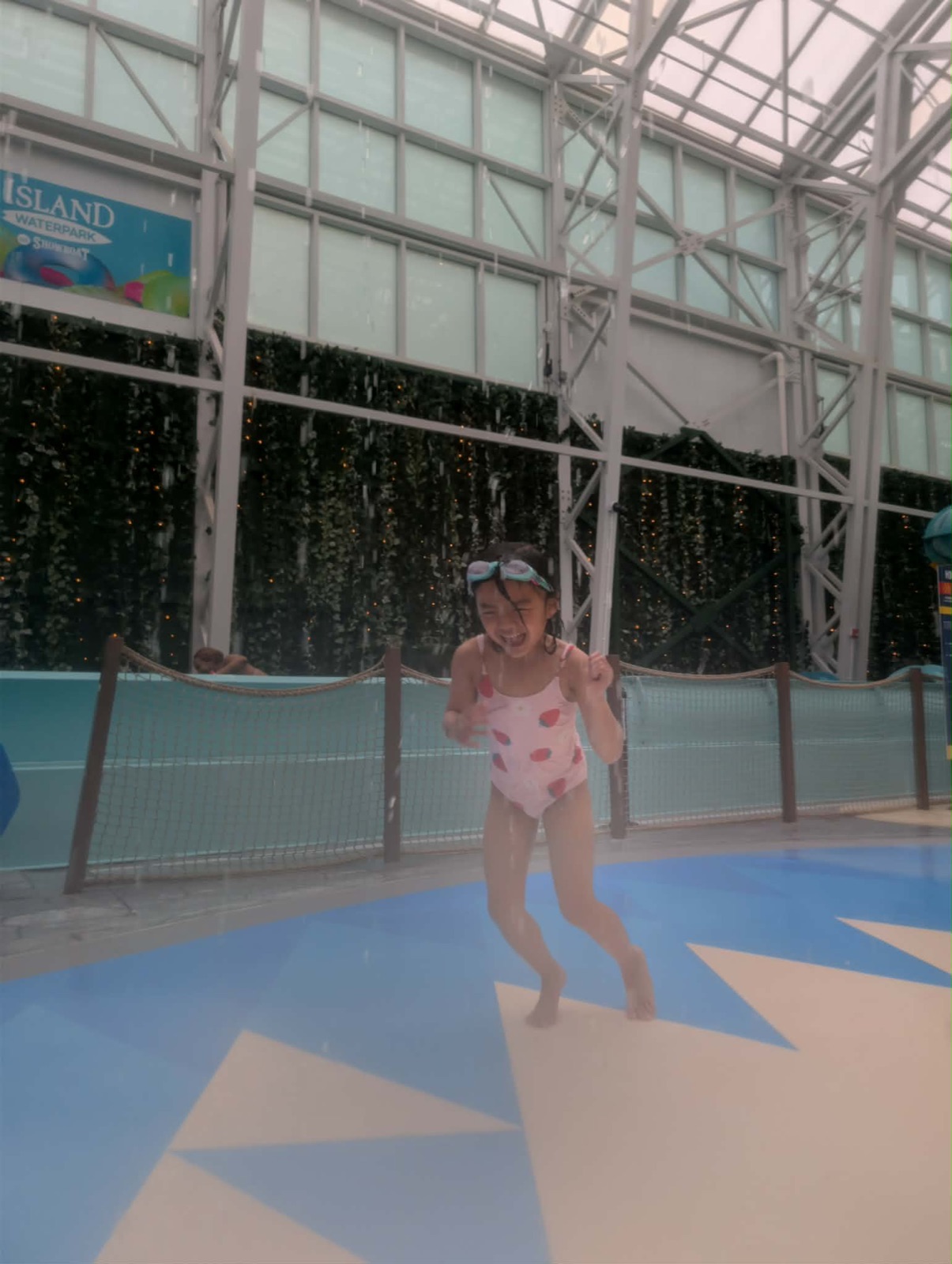 Charlotte running through Island Water Park