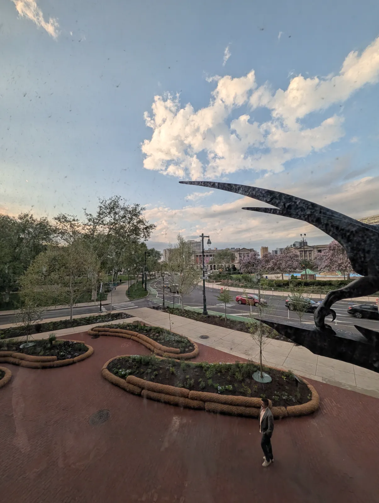 Scenic outdoor view from the Academy showing landscaped gardens and the city