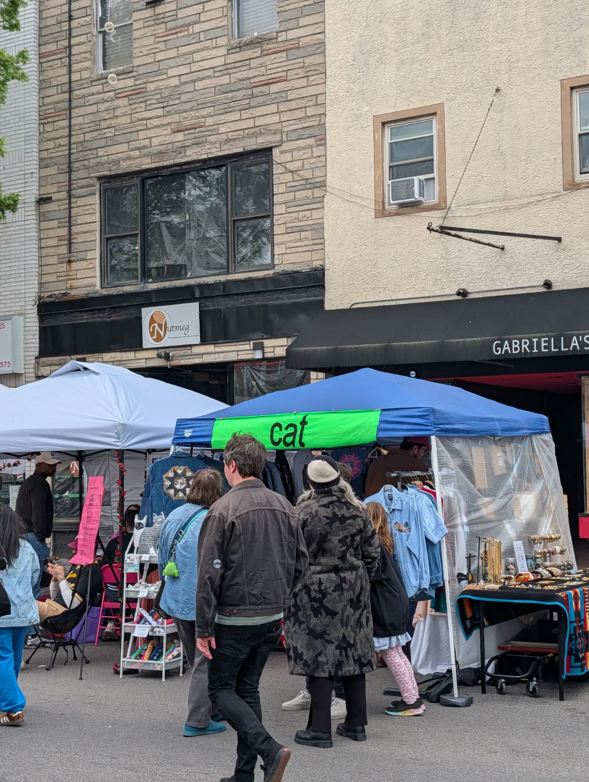 Crowds exploring vendor booths at Flavors on the Avenue on East Passyunk