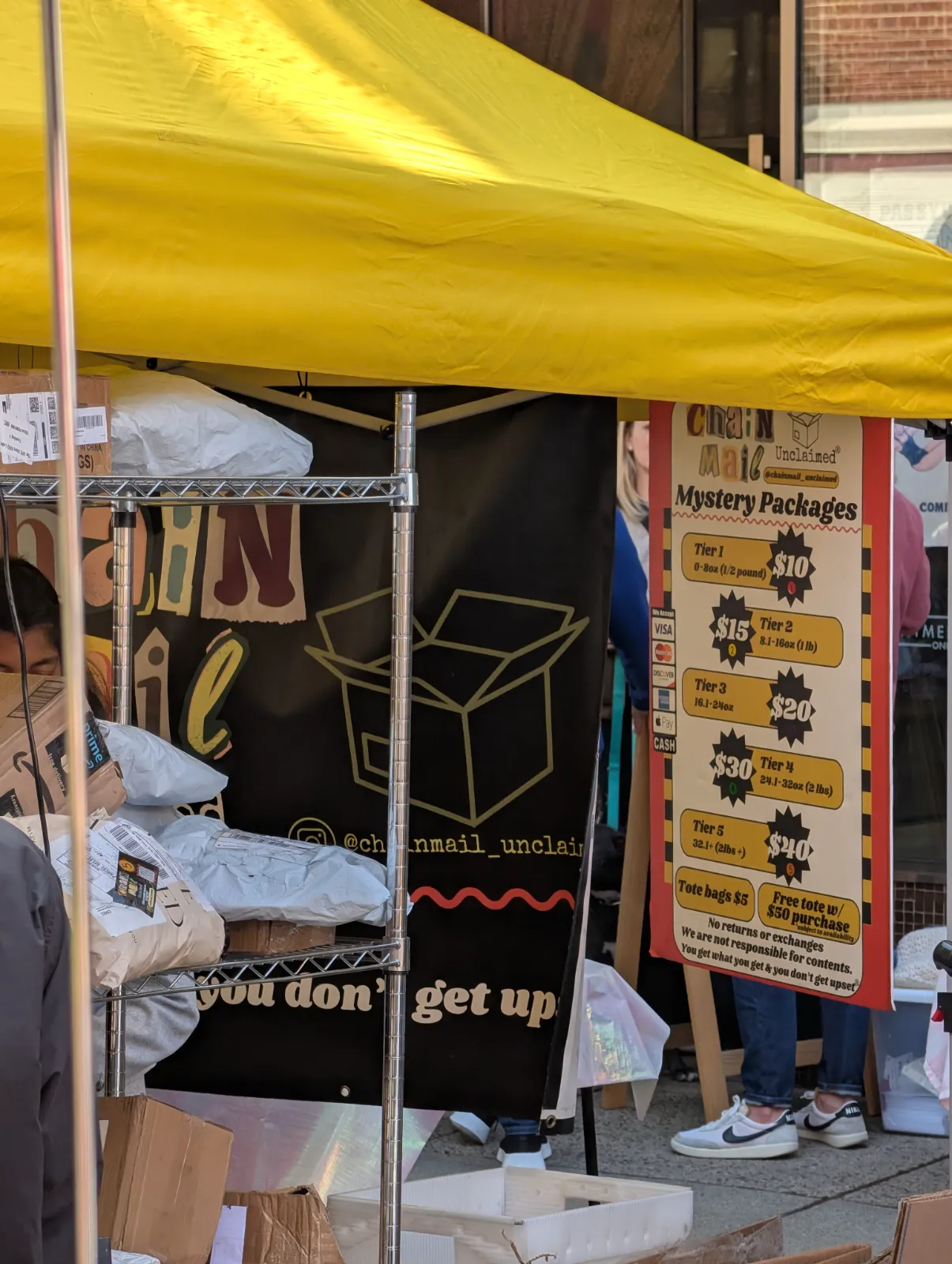 Mystery packages for sale at a vendor booth at Flavors on the Avenue