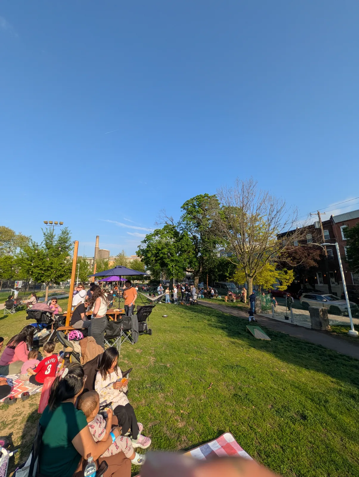 Families relaxing and playing at Parks on Tap at Columbus Square