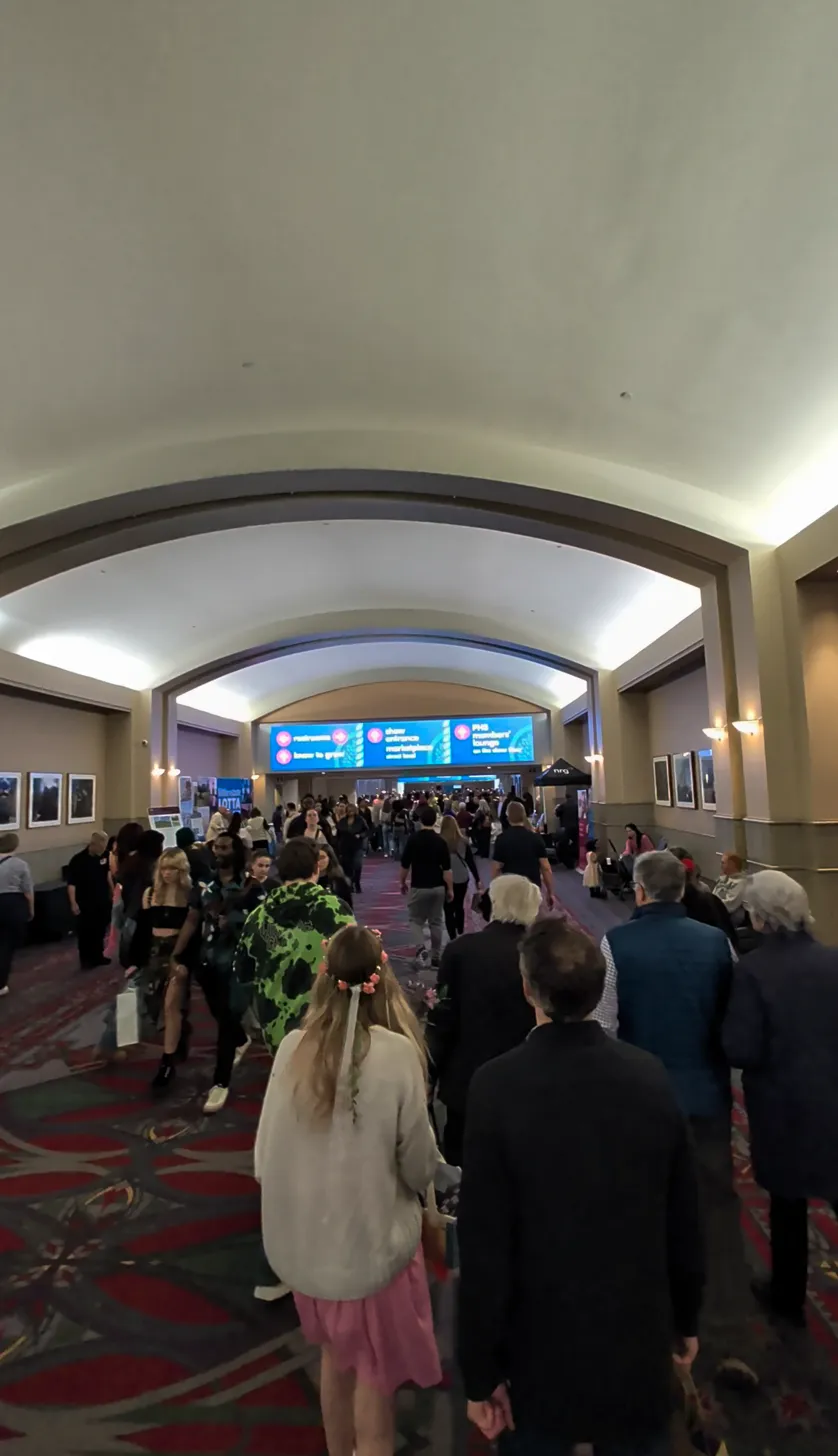 Packed hallway at the Convention Center on the last Sunday of the Philly Flower Show with Charlotte walking ahead